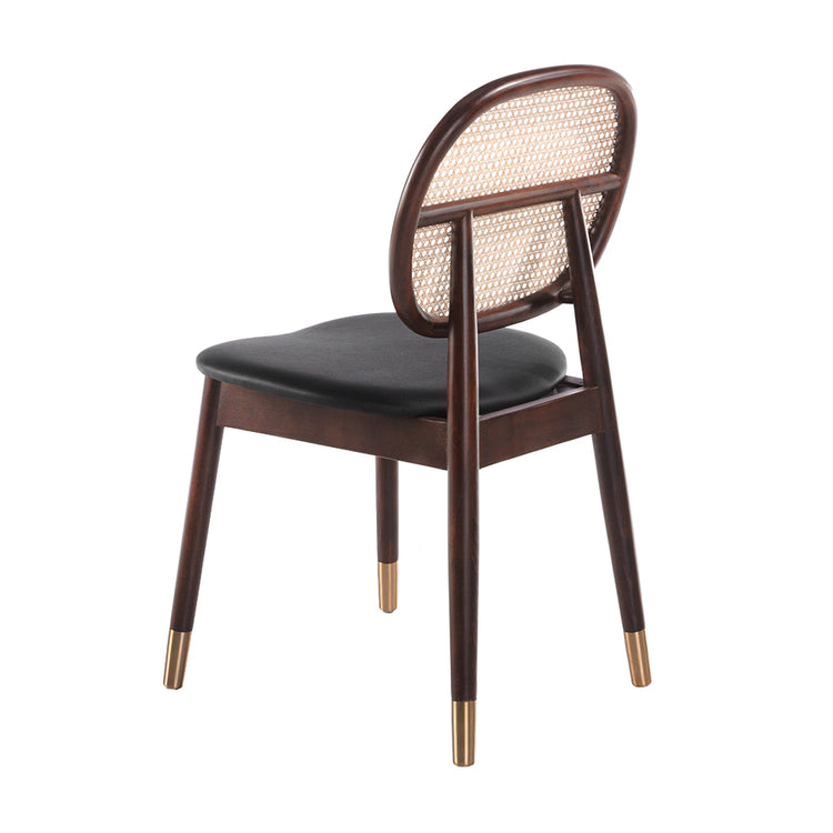 Chair upholstered in leatherette with rattan backrest and walnut wood legs - Angel Cerdá