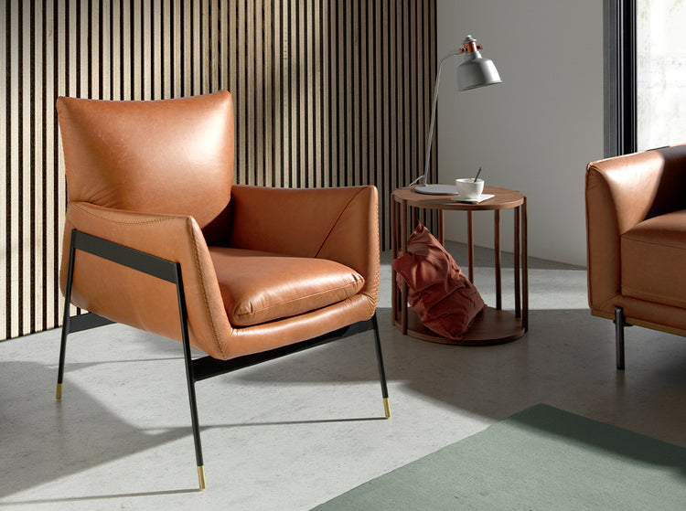 Upholstered leather armchair with steel legs - Angel Cerdá, S.L.