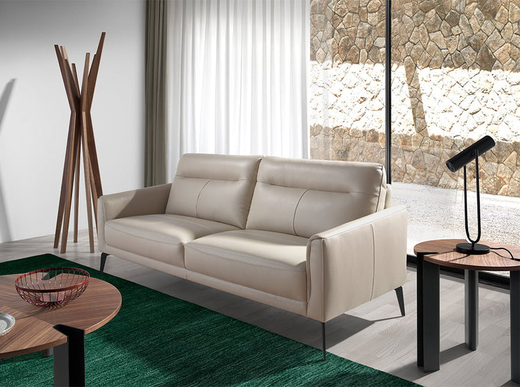 3 seater sofa upholstered in taupe grey leather with black steel legs - Furniture of design. Angel Cerdá