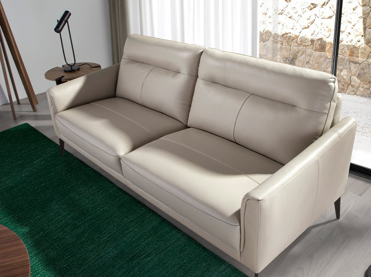 3 seater sofa upholstered in taupe grey leather with black steel legs - Furniture of design. Angel Cerdá