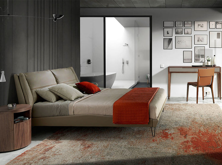 King size bed upholstered with black painted steel legs - Angel Cerdá S.L
