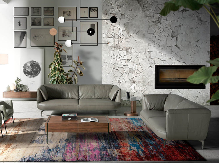 2 seat sofa leather upholstered with polished steel legs - Angel Cerdá S.L