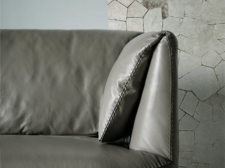 2 seat sofa leather upholstered with polished steel legs - Angel Cerdá S.L