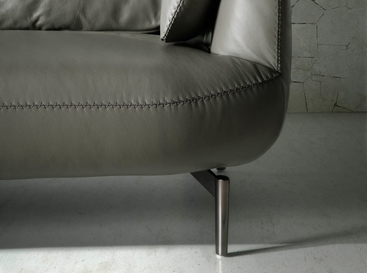 2 seat sofa leather upholstered with polished steel legs - Angel Cerdá S.L
