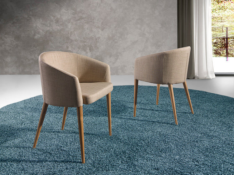 Upholstered armchair with legs in walnut colour - Angel Cerdá S.L