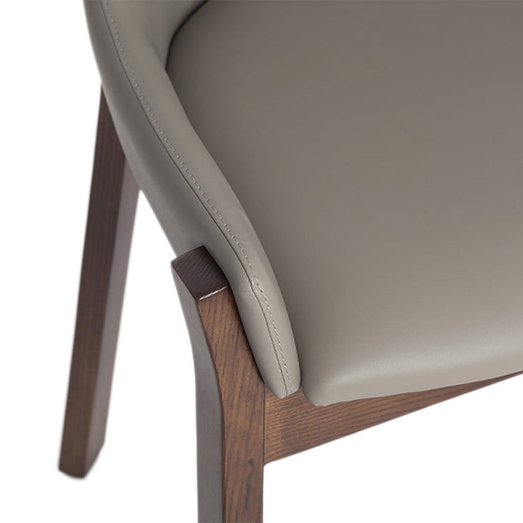 Chair upholstered in leatherette and Walnut colored wooden structure