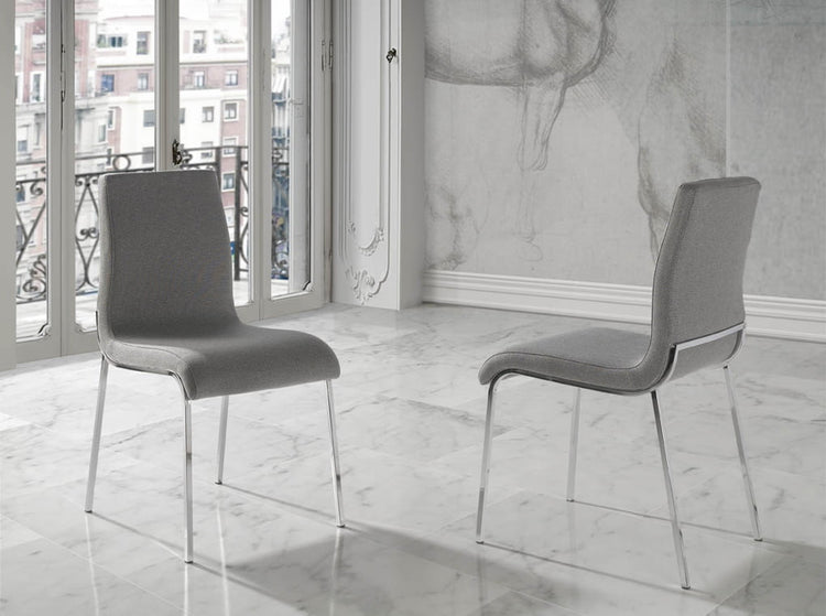 Upholstered chair with stainless steel frame - Angel Cerdá S.L