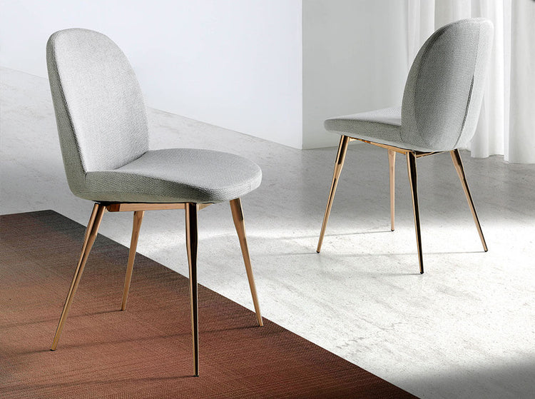 Chair upholstered in fabric and stainless steel legs - Angel Cerdá S.L