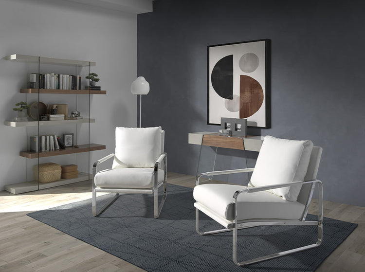 Upholstered armchair with stainless steel frame - Angel Cerdá S.L