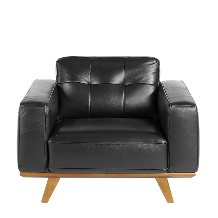 Leather upholstered armchair with solid walnut legs - Angel Cerdá, S.L.