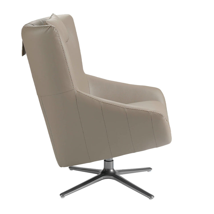 Upholstered in leather armchair with stainless steel - Angel Cerdá S.L