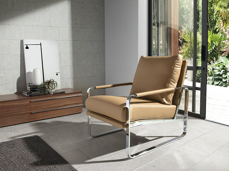 Upholstered armchair with stainless steel frame - Angel Cerdá S.L