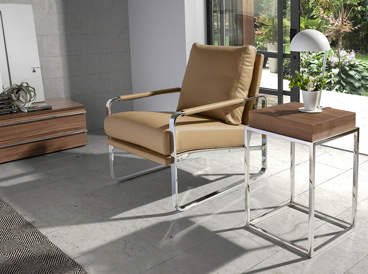 Upholstered armchair with stainless steel frame - Angel Cerdá S.L