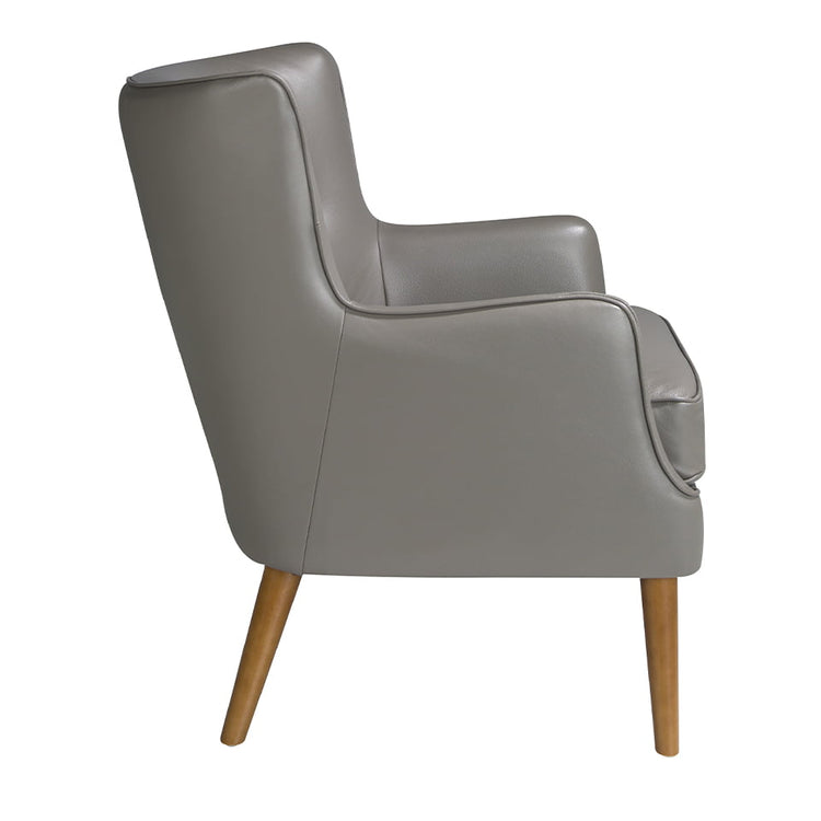 Armchair upholstered in leather with capitone effect - Angel Cerdá S.L.