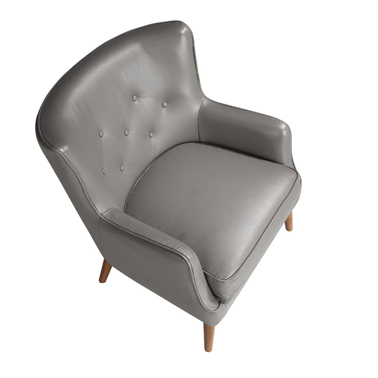 Armchair upholstered in leather with capitone effect - Angel Cerdá S.L.