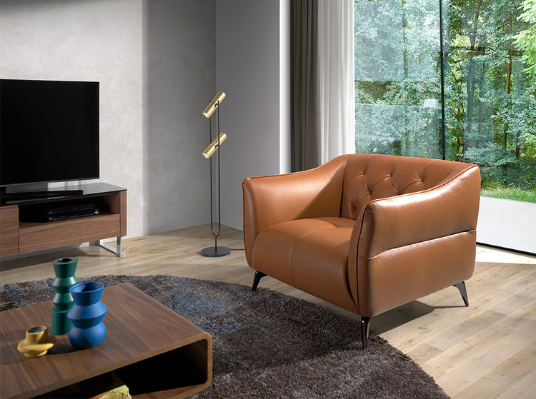 Armchair upholstered in brown leather with capitonné-Angel Cerdá