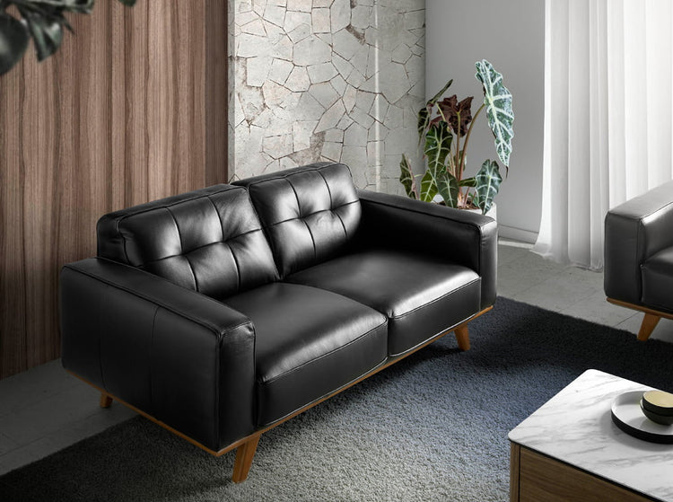 2 seat leather upholstered sofa with solid walnut legs - Angel Cerdá S.L