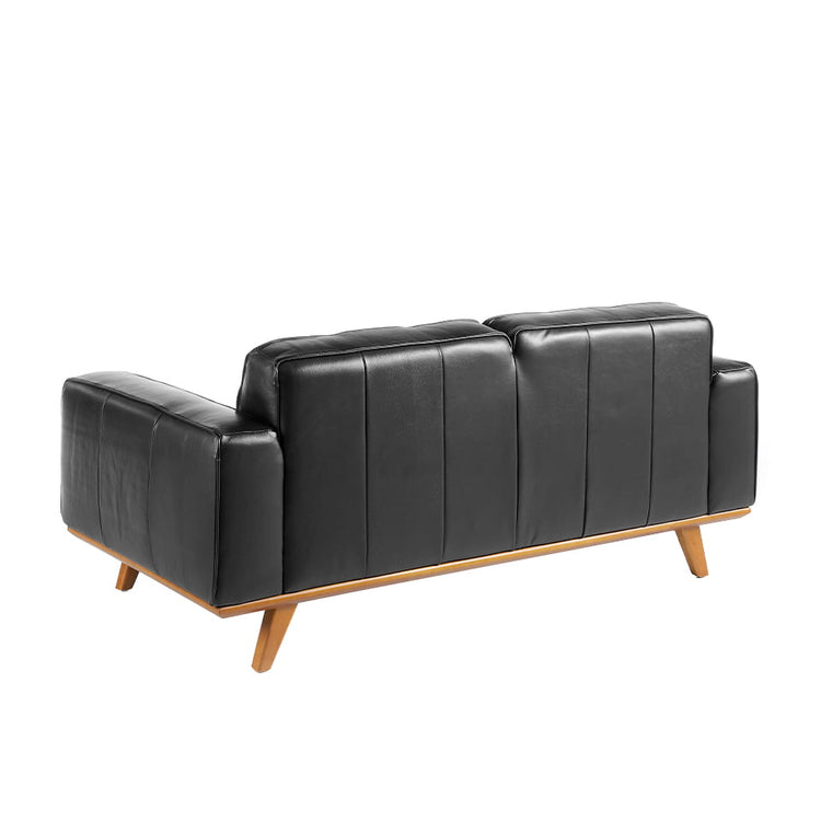 2 seat leather upholstered sofa with solid walnut legs - Angel Cerdá S.L