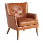 Armchair upholstered in leather with capitone effect - Angel Cerdá S.L.