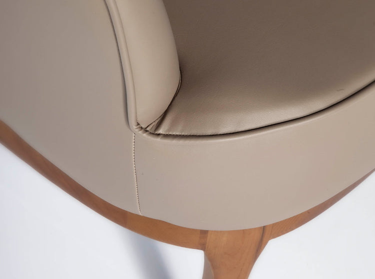 Upholstered armchair in leatherette - Angel Cerdá, S.L.